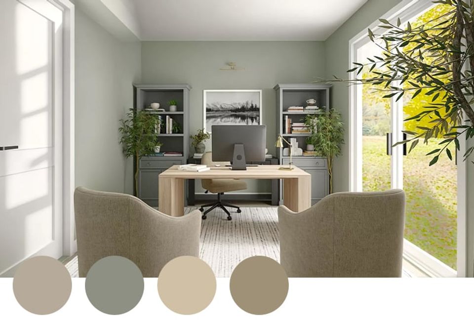 Bright, airy office with soft sage green walls, natural wood desk, and muted neutral tones creating a peaceful, contemporary workspace.