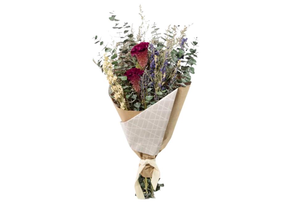 Eclectic dried flower mix in cream wrapping with burgundy, green, and gold tones