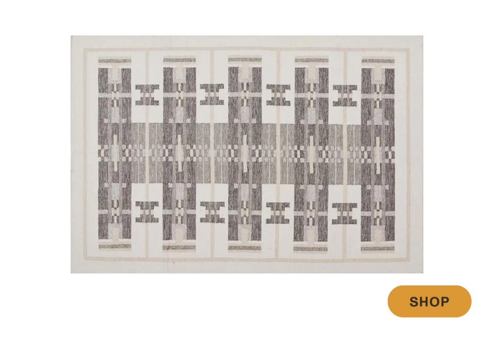 Contemporary gray and white area rug with abstract linear grid and textural layered design