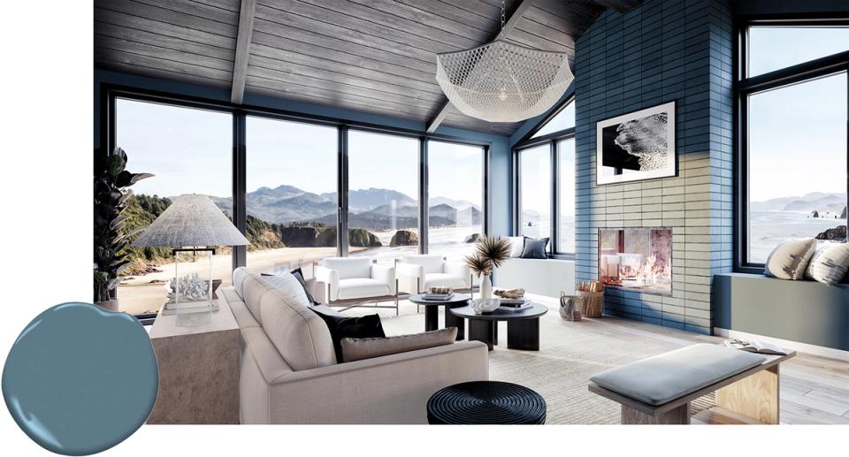 Modern bedroom with teal accent wall, floor-to-ceiling windows, and neutral furnishings evoking coastal serenity