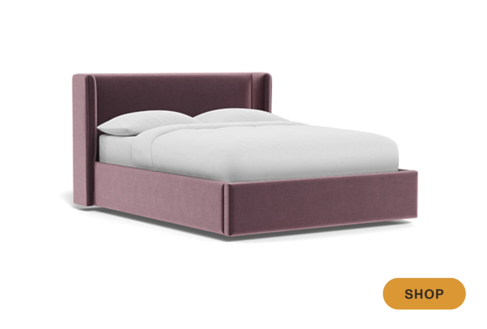 Modern upholstered storage bed in mauve with clean lines and minimalist aesthetic