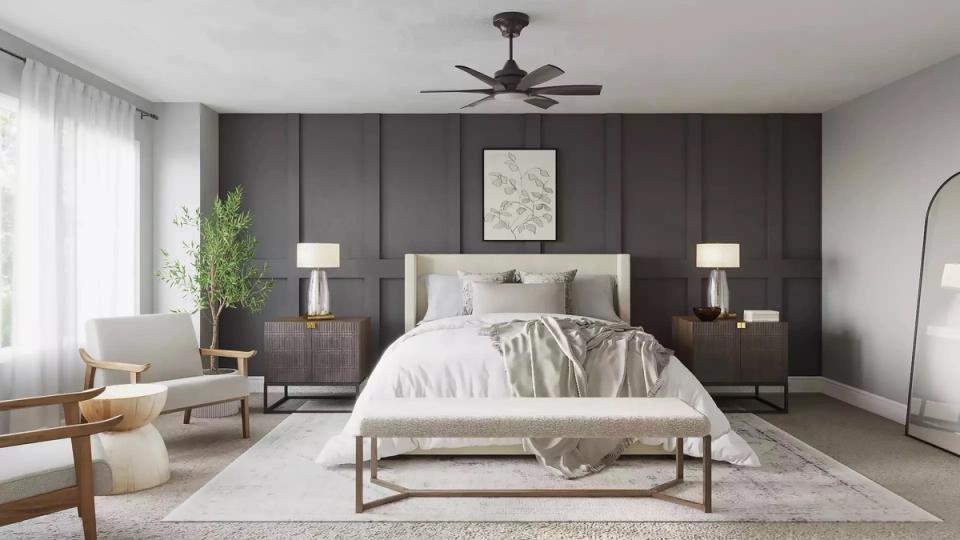 Modern bedroom with charcoal paneled accent wall, neutral bedding, and minimalist wood furnishings creating a sophisticated, calming sanctuary.