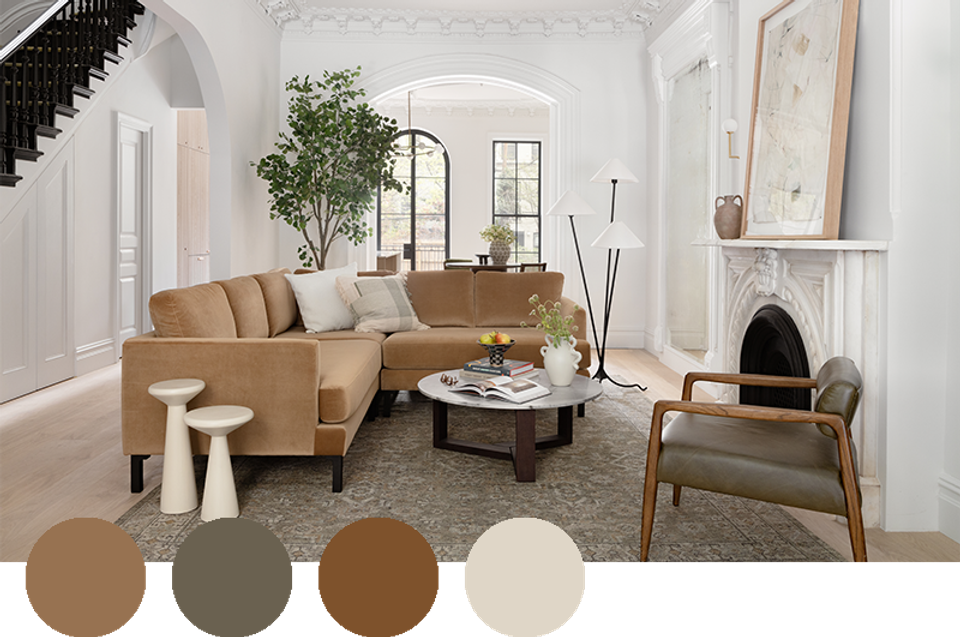 Light-filled living room in caramel, taupe, and cream with natural wood mid-century touches.