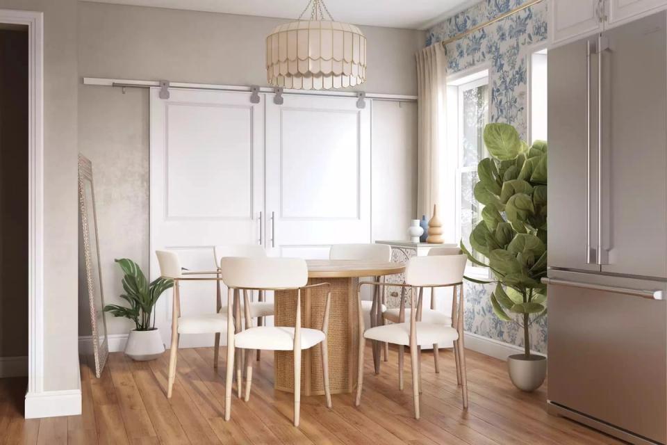 Modern coastal dining with two-tone walls, natural wood table, woven pendant, and greenery