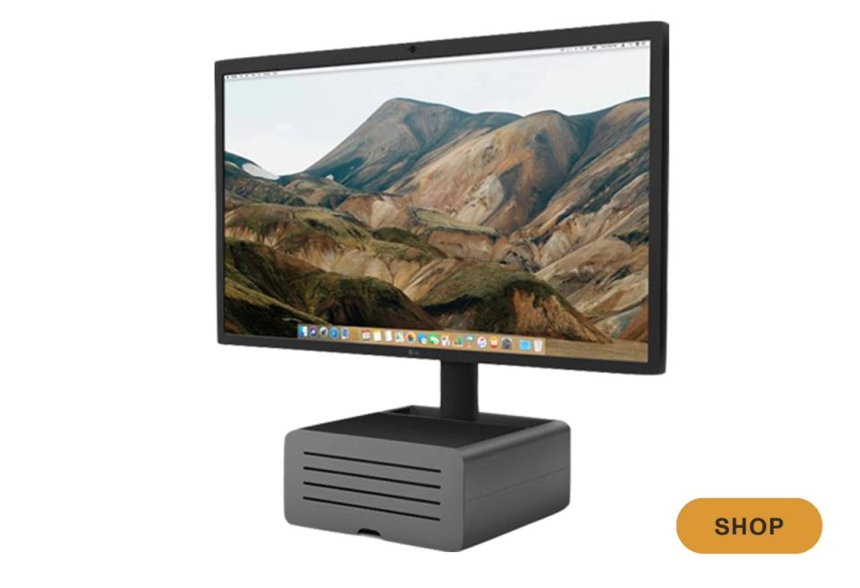 Modern monitor stand in charcoal with elevated tech-forward workspace aesthetic