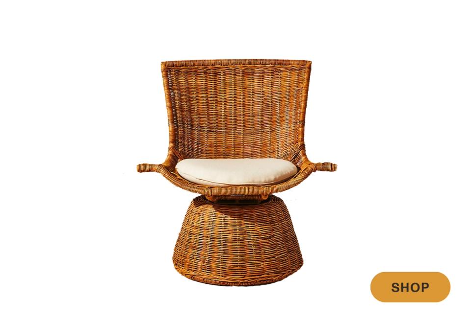 Organic coastal swivel chair in woven rattan with cream cushion