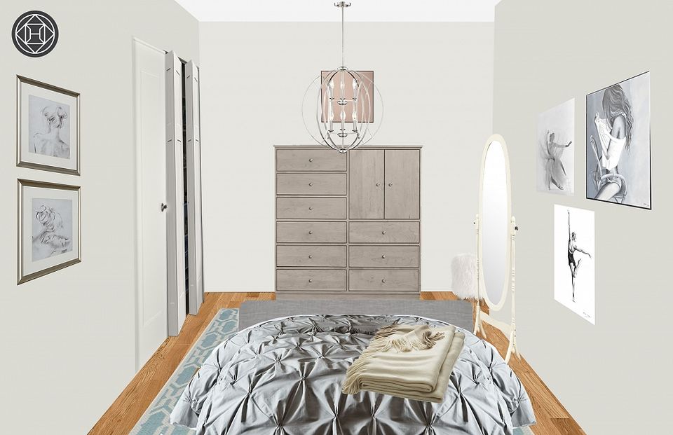 Serene bedroom with gray dresser, minimalist gallery wall, and geometric bedding