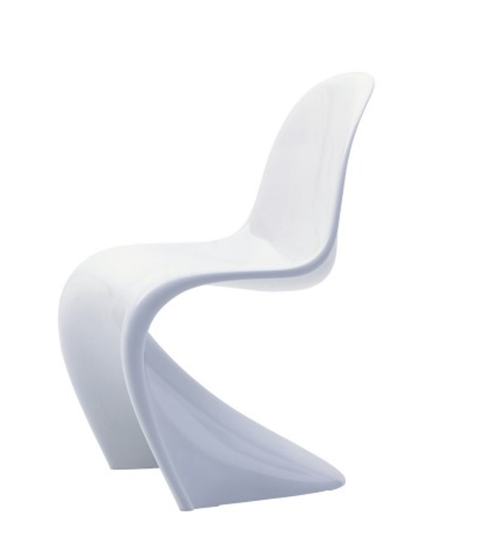 Sculptural white molded plastic chair with flowing S-curve silhouette and minimalist modern design
