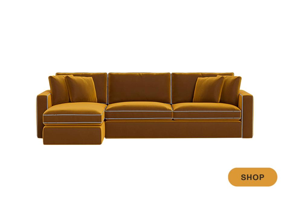Luxe cognac velvet sectional sleeper with brass nailhead trim