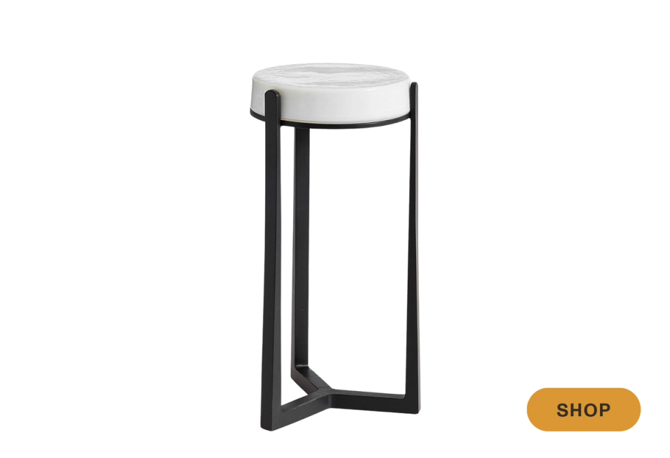 Modern martini table with geometric black frame and white circular top