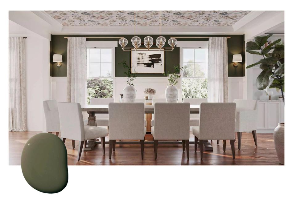 Transitional dining room with muted olive-green accent wall, natural wood tones, and airy neutrals balancing moody sophistication