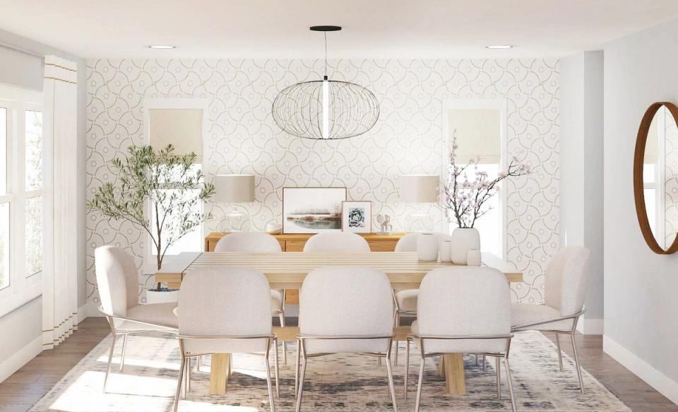 Scandinavian dining room with geometric wallpaper, natural wood table, cream chairs, and minimalist pendant light