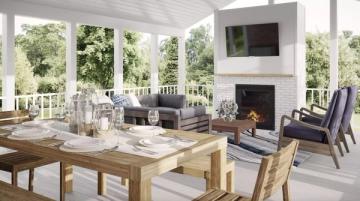 Bright sunroom with fireplace, wood beam ceiling, and all-white aesthetic
