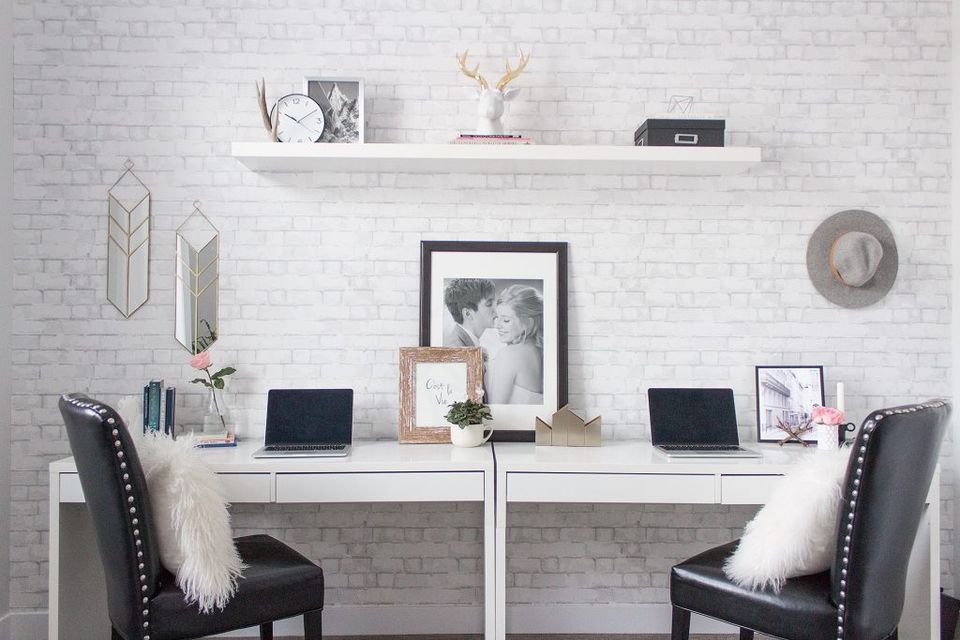 Minimalist home office with subway tile, monochromatic black and white palette, clean lines, and airy elegance.
