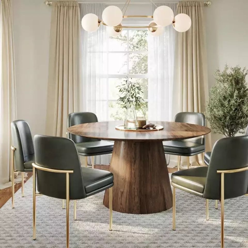 Contemporary dining room featuring Gray Mist tones, walnut table, and gold-trimmed chairs