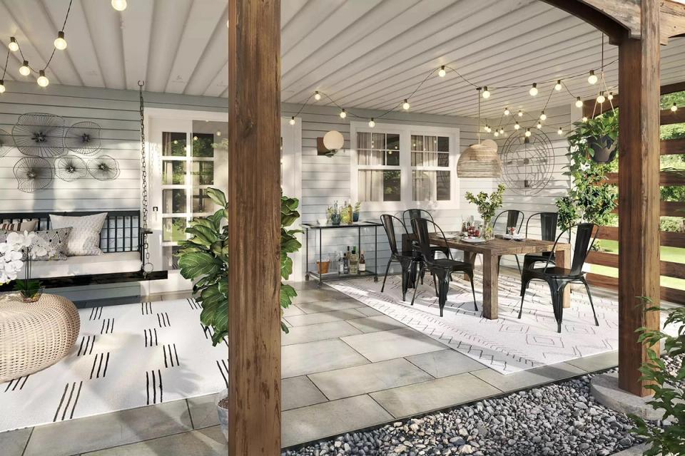 Contemporary covered patio blending indoor-outdoor living with geometric patterns and string lighting for ambiance.