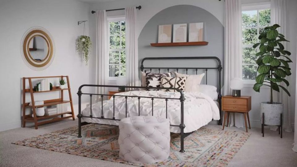 Serene bedroom blending industrial iron bed frame with soft textures, warm wood shelving, and arched alcove in calming neutral tones.