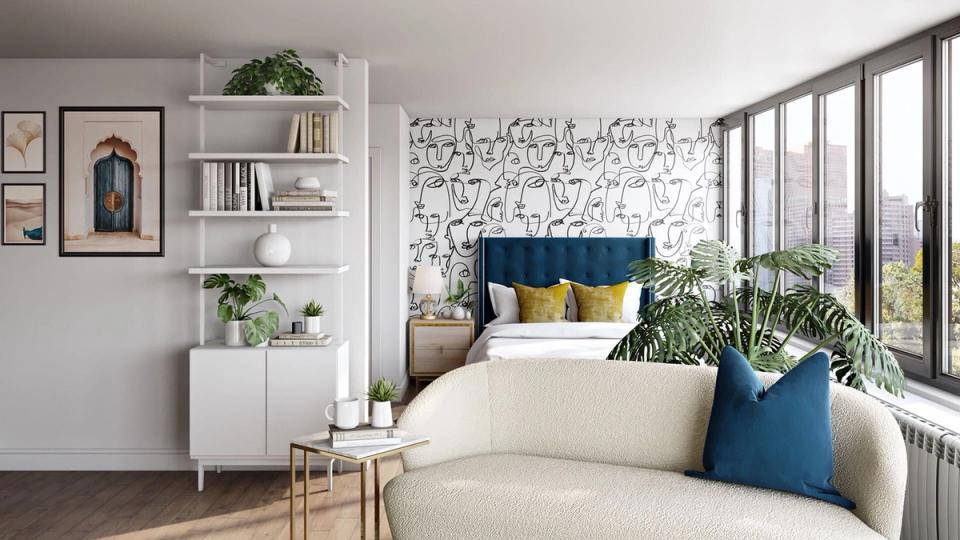 Modern studio bedroom with botanical accents, blue and yellow palette, floral wallpaper