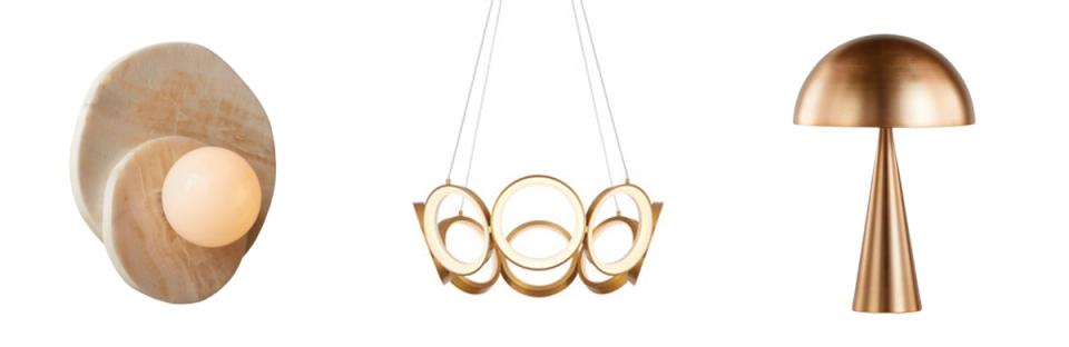 Three sculptural brass and wood pendant lights showcasing modern, geometric designs with warm metallic finishes and organic forms