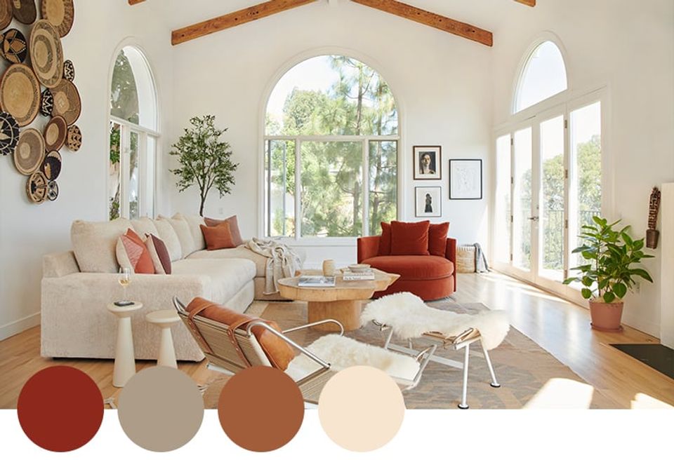 Mediterranean-inspired space with terracotta, warm tan, and cream tones, arched windows, and woven accents