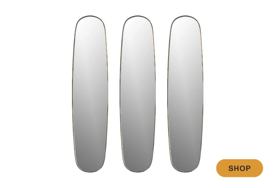 Three rounded mirror panels in soft gradient finish for contemporary wall arrangement