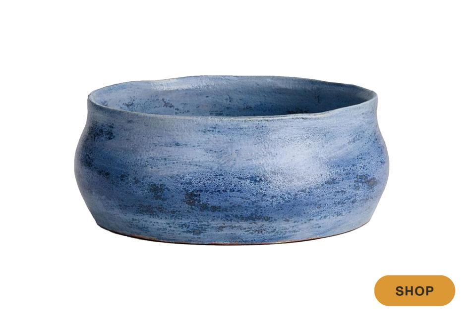 Artisanal blue ceramic bowl with rustic glazed finish