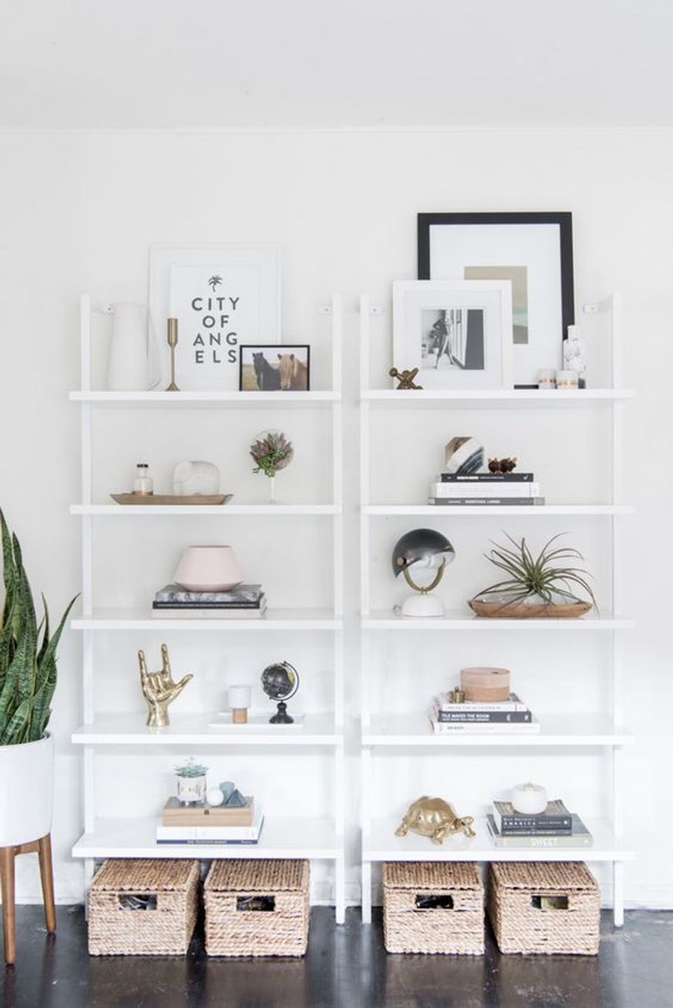 Minimalist white shelving with curated décor, natural textures, and woven storage baskets