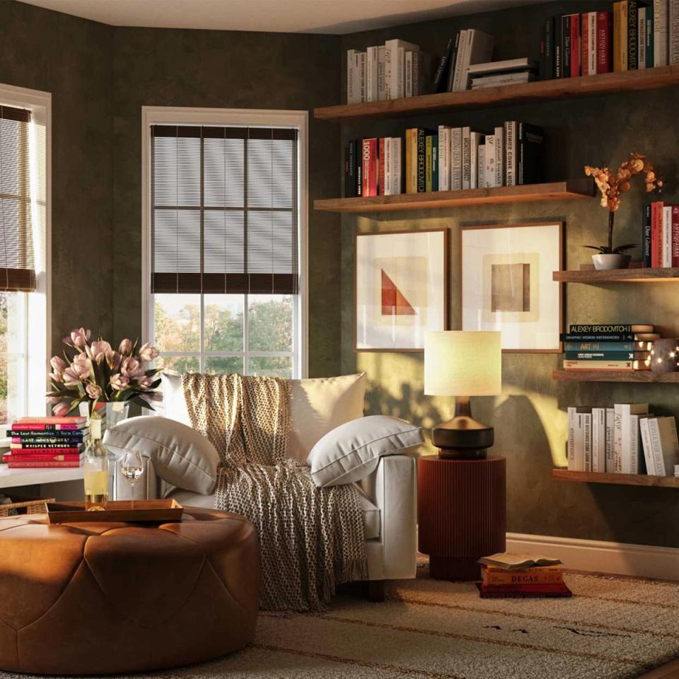 Warm, earthy reading nook with olive walls, cream armchair, wooden shelving, and golden ambient lighting