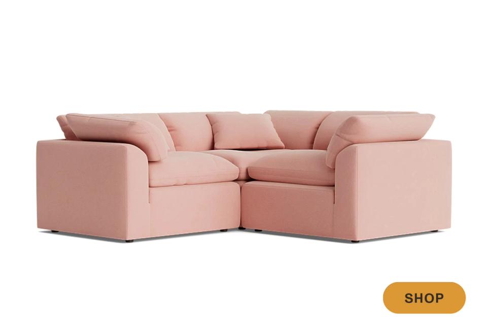 Soft pink modular sectional with streamlined silhouette and plush cushioning