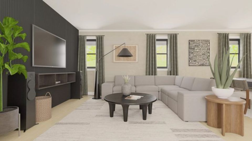 Modern living room blending dark sage green accent wall with light neutrals, creating sophisticated contrast in an airy open floor plan.