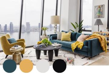 Modern urban living room with teal, mustard, and black creating bold contrast against floor-to-ceiling city views