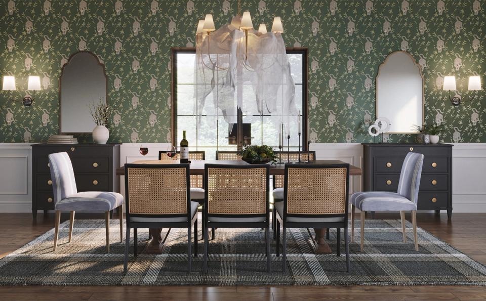 Gothic glam vanity with emerald damask wallpaper, black cabinetry, and ornate mirrors