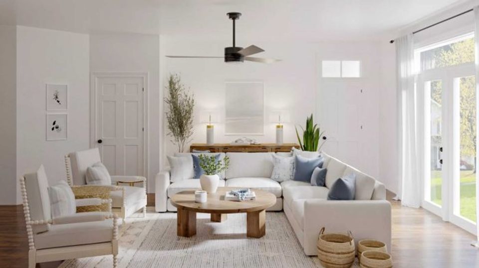 Bright, airy traditional living room with cream upholstery, natural wood accents, and soft neutral palette creating a serene, timeless atmosphere.