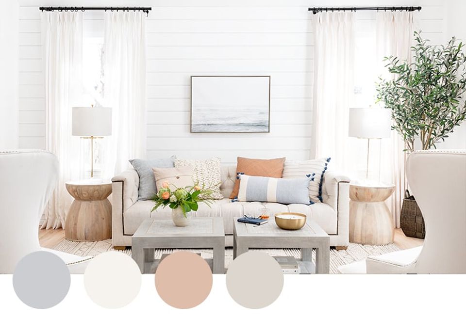 Serene neutral living room with warm beige and cream tones, natural light, and organic greenery accents