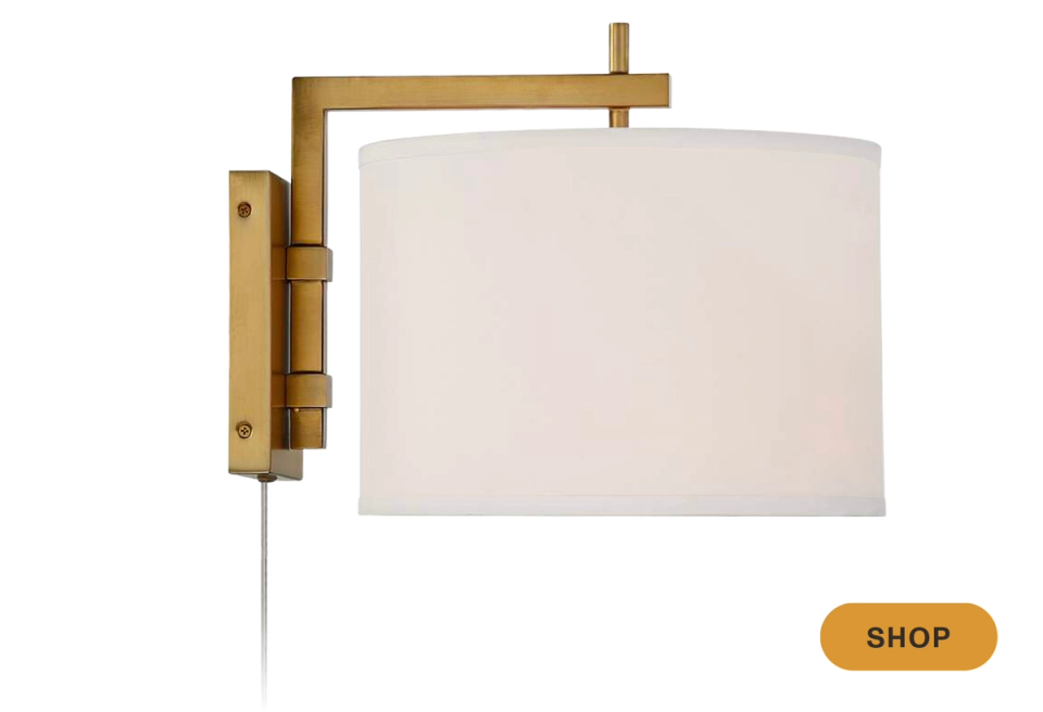 Contemporary wooden wall sconce with clean geometric lines and soft cream linen shade