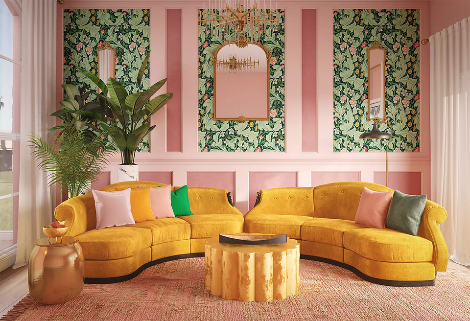 Maximalist living room with curved mustard sofa, pink striped walls, botanical wall art, and warm jewel-tone accents creating bold, playful atmosphere.