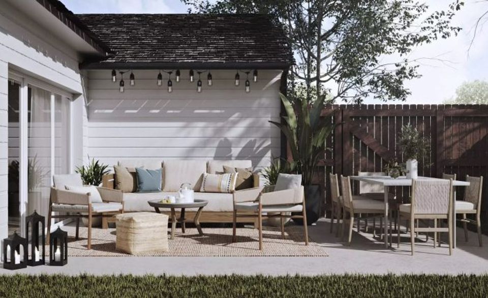 Contemporary garage patio blending beige upholstery with natural wood tones and hanging string lights for relaxed elegance.