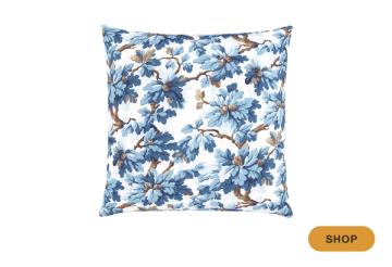 Classic blue and white floral throw pillow with birds and botanical motifs