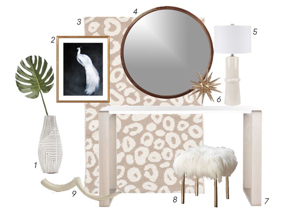 Neutral entryway styling elements: round mirror, botanical art, patterned rug, and modern accessories