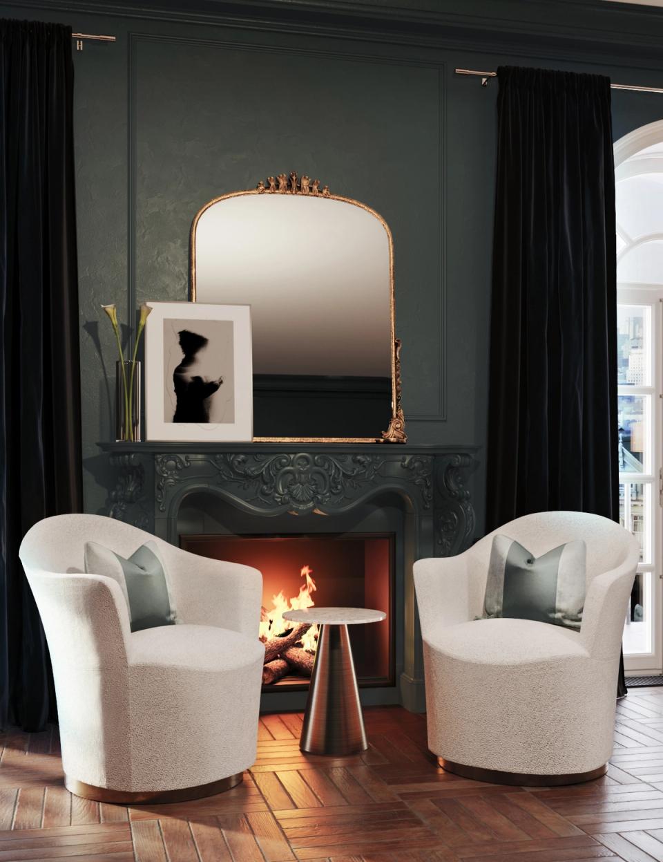 Dark luxe fireplace lounge with forest green walls, cream curved chairs, and glowing flames