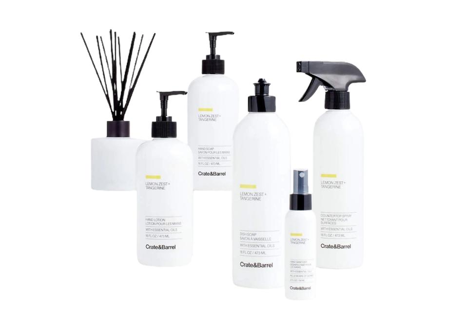 Organized minimalist home care collection with white bottles and black accents