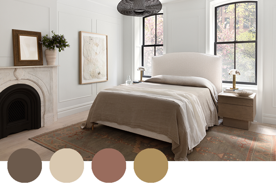 Serene bedroom in warm neutral palette with taupe, cream, and soft pink undertones.