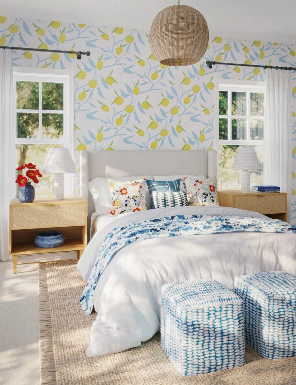 Cheerful cottage bedroom with yellow leaf wallpaper, blue accents, and bright airy mood