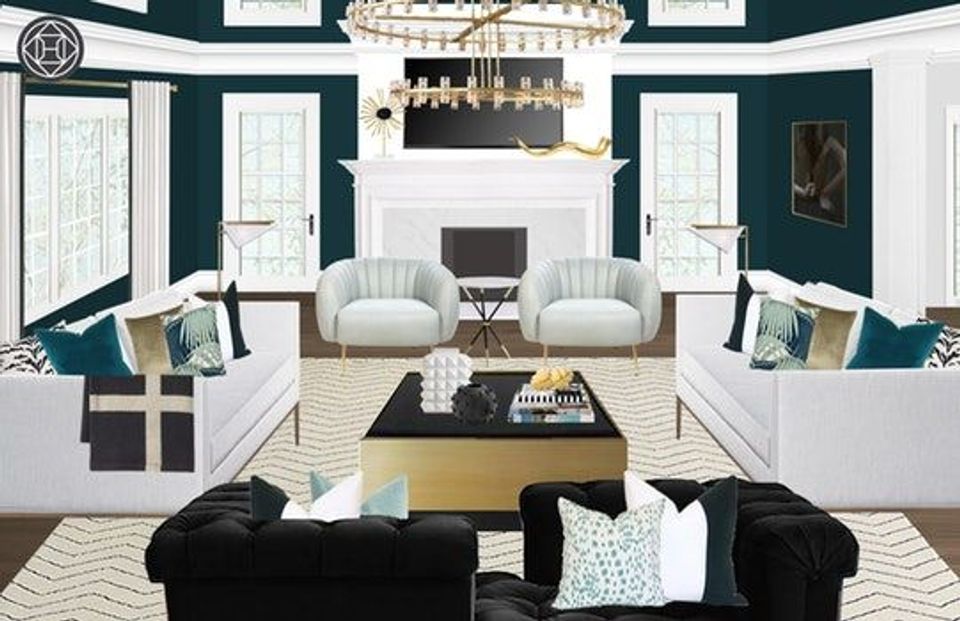 Luxe lounge with deep teal walls, symmetrical cream furniture, black coffee table, and brass chandelier