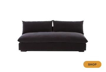Sleek black contemporary sofa with low-profile cushioned seating