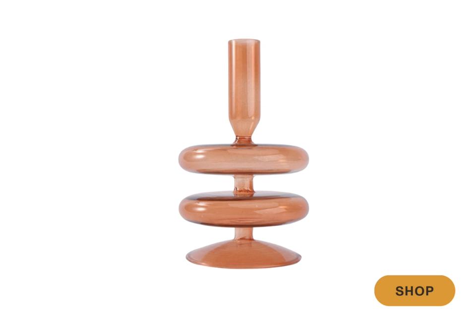 Warm copper-toned tiered jewelry organizer with minimalist, modern design aesthetic