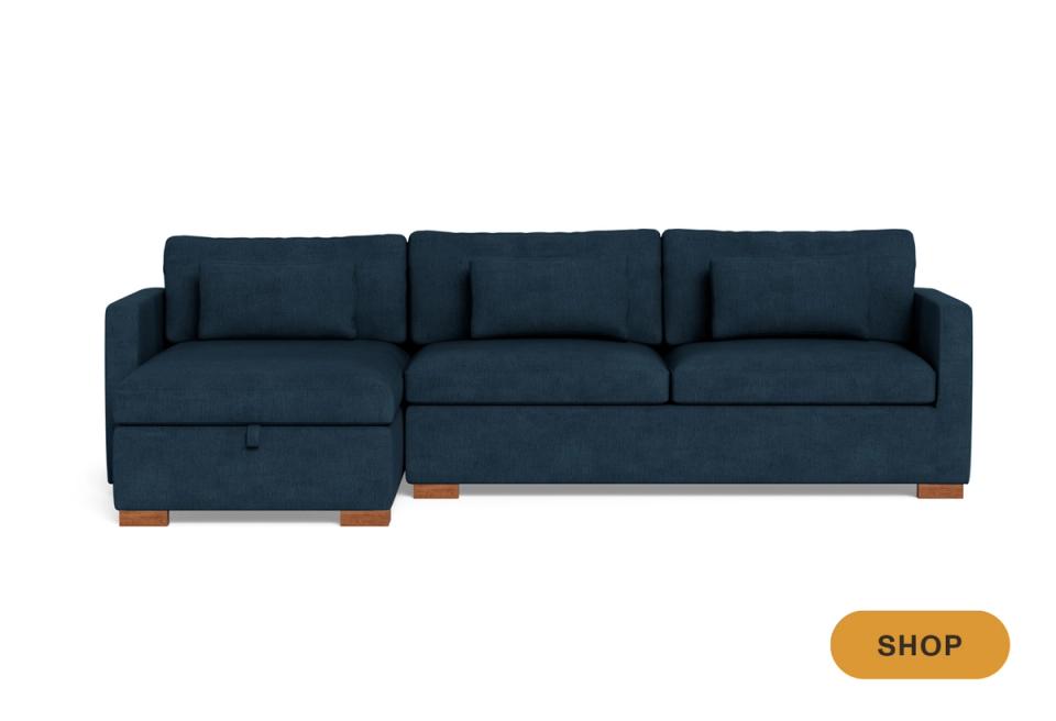 Contemporary navy sectional sleeper sofa with wooden legs and storage