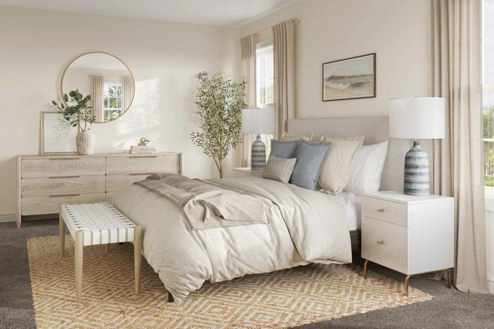 Minimalist bedroom with soft neutrals, geometric patterns, and natural light-filled ambiance