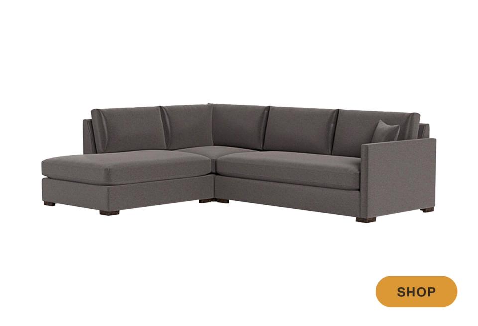 Modern charcoal gray L-shaped sectional with clean lines and contemporary design