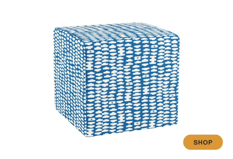 Blue and white woven cube ottoman with geometric pattern